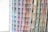 Various pages with vertical columns of color swatches arranged in a pattern, displaying a spectrum ranging from blues and purples to browns and greens.