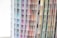 Various pages with vertical columns of color swatches arranged in a pattern, displaying a spectrum ranging from blues and purples to browns and greens.