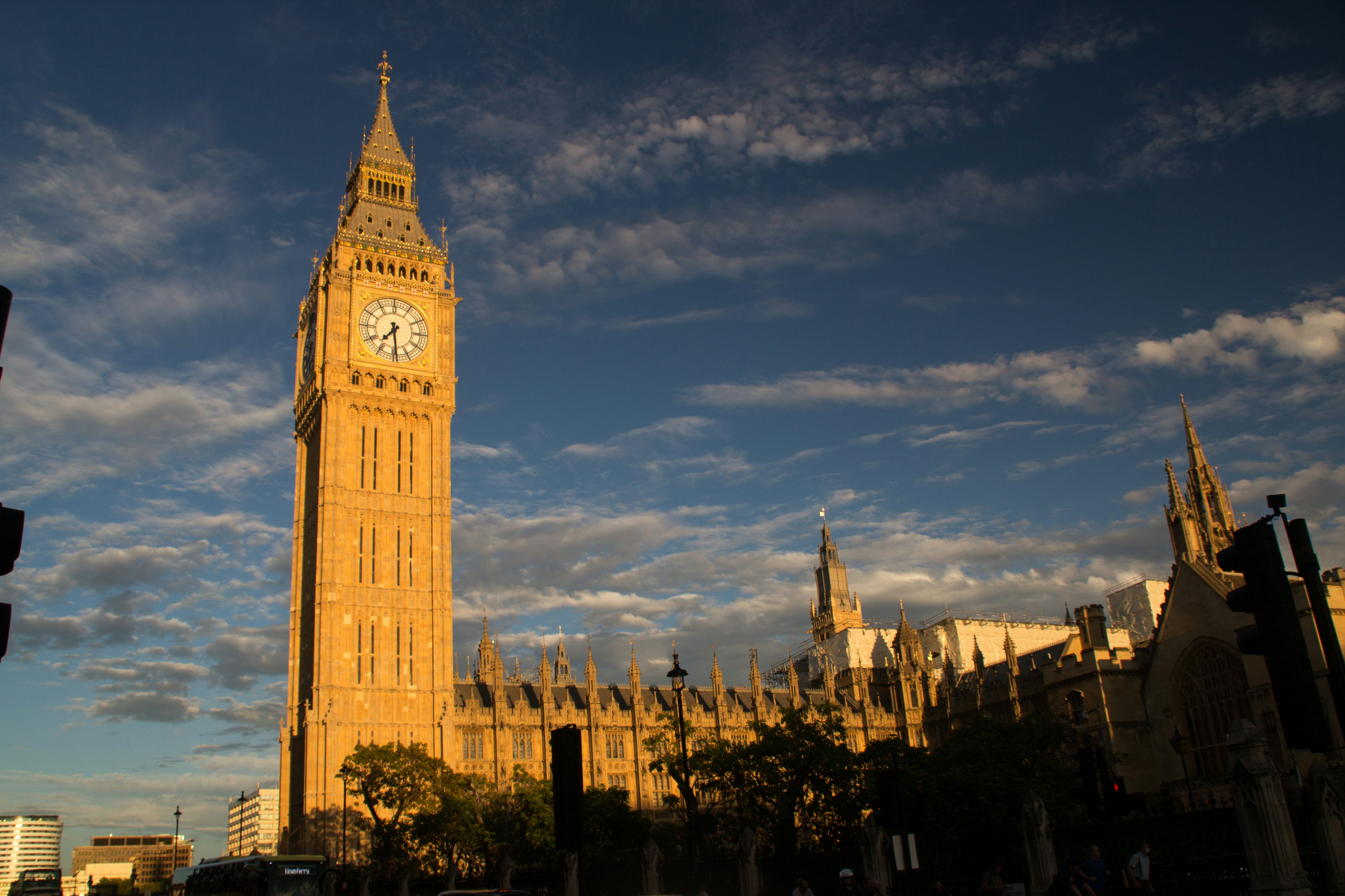 a large clock tower towering over a city