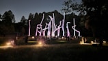 Nighttime photo of an interactive light art installation in a Madrid park.