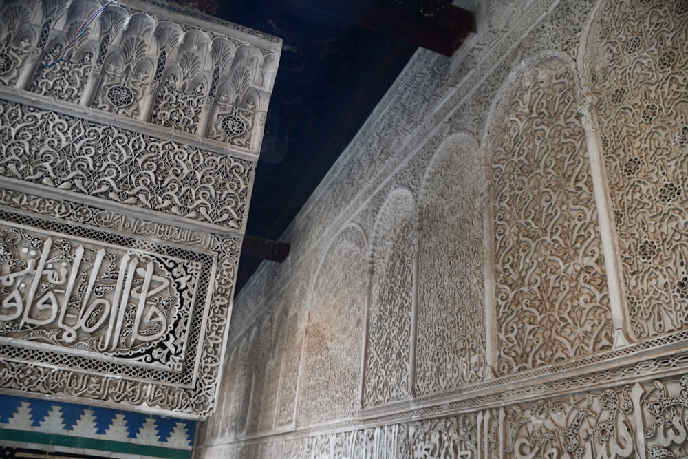 an intricately decorated wall in a building