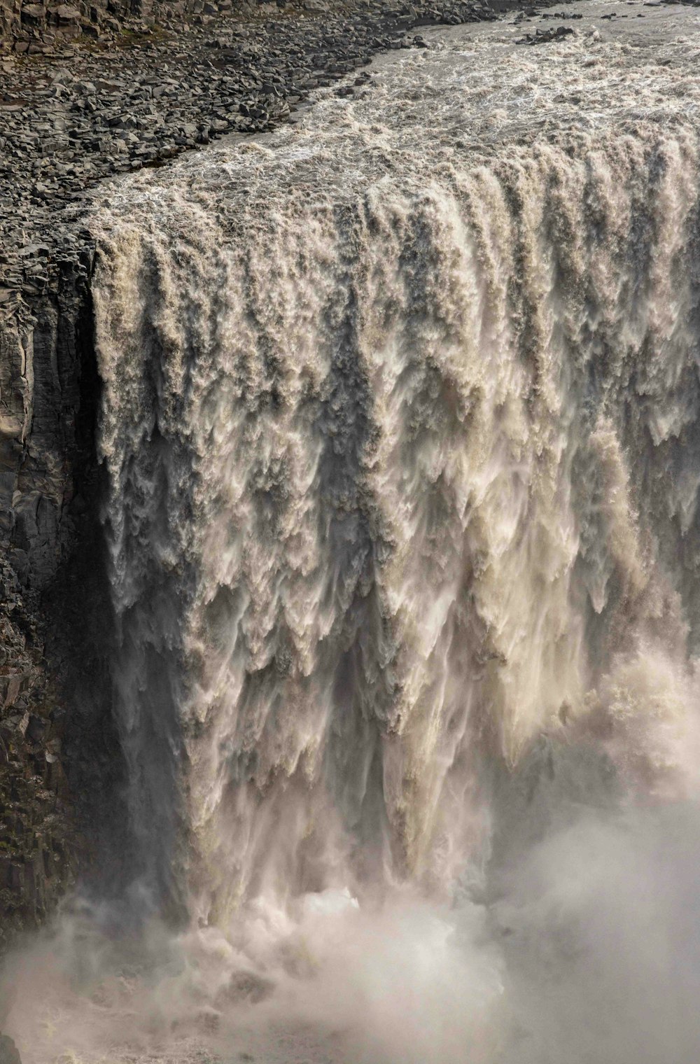 a large waterfall that has water coming out of it