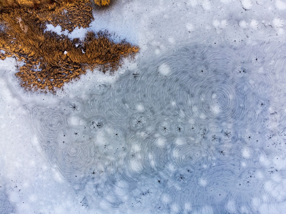 an aerial view of a snow covered ground