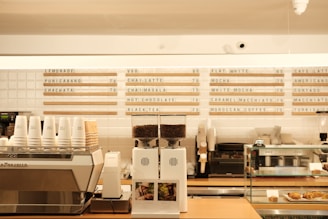 Assorted coffee and non-coffee drinks displayed on a counter.
