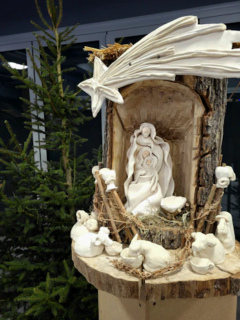 Close-up of a finely carved wooden figure from the famous Tischlerei Tscheschner nativity scene.