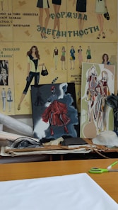 Portrait of a woman designing sportswear sketches in a cozy studio.