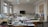 A well-lit room filled with sewing machines and various sewing materials scattered across large tables. The walls have sketches of fashion designs, and there's a chalkboard at the far end. The windows let in natural light, illuminating the workspace.