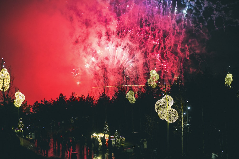 a red sky filled with lots of fireworks