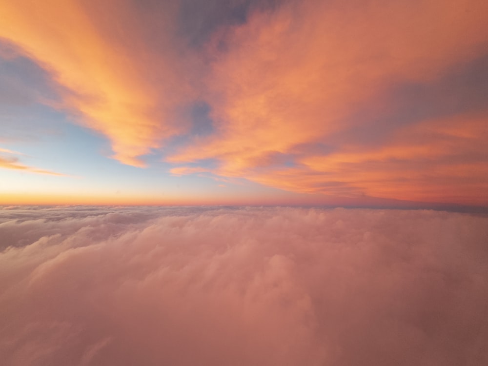 a view of the sky and clouds from an airplane