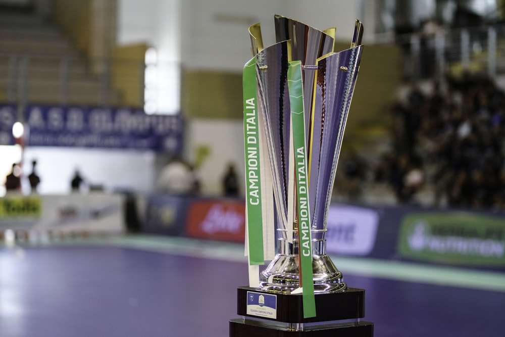a trophy sitting on top of a wooden table
