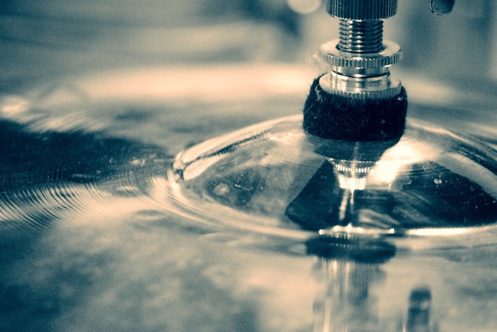 a close up of a faucet on a sink