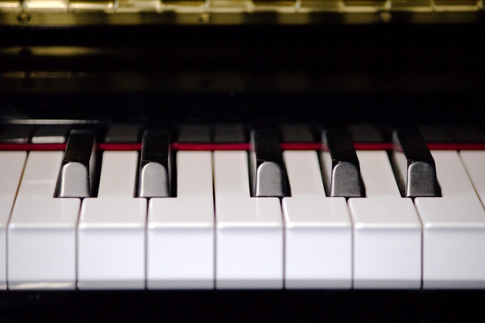 a close up view of a piano keyboard