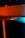 The image features the logo of Creality, likely on a 3D printer or similar device. The logo is set against a background with contrasting light, creating a dramatic effect. The lighting highlights the metallic texture of the logo, with a blend of warm orange and cool blue tones.