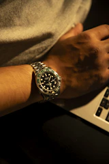 a close up of a person's wrist with a watch on it