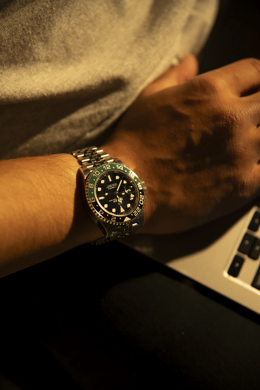 Wristwatch worn on the wrist in an editorial photograph