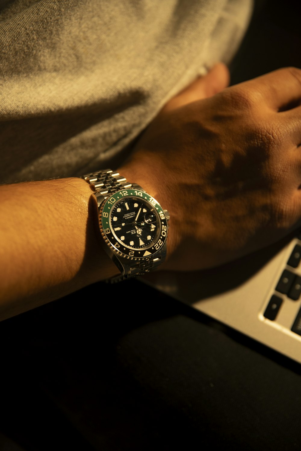 a close up of a person's wrist with a watch on it