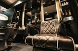 Luxurious barber chair in a stylish, modern barbershop setting.