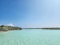 Crystal-clear waters of Palawan with lush green islands.