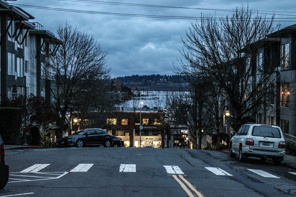 a street with cars parked on both sides of it