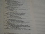A close-up view of a page from a book with text in a serif font. The text appears to be in English and contains numbered paragraphs with religious or historical content. There are dotted lines on the right side of the page, possibly indicating space for notes.