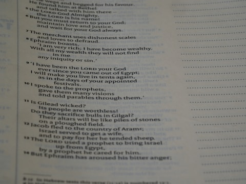 A close-up view of a page from a book with text in a serif font. The text appears to be in English and contains numbered paragraphs with religious or historical content. There are dotted lines on the right side of the page, possibly indicating space for notes.