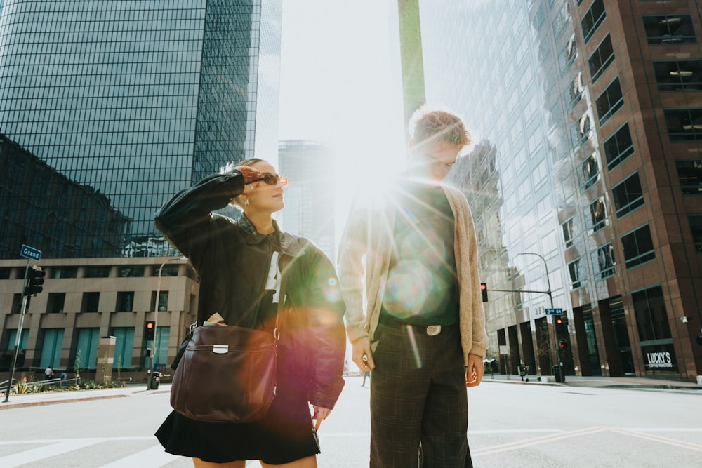 a couple of people that are standing in the street