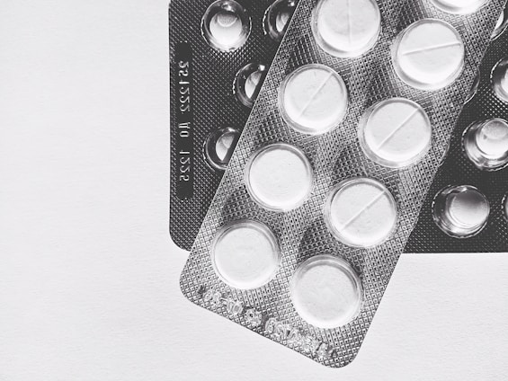 Close-up of a pristine medicine carton with crisp printing and vibrant colors, highlighting detailed precision and finish.