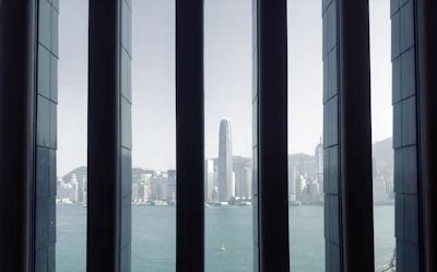Corner office window setup providing panoramic city views with minimal frames
