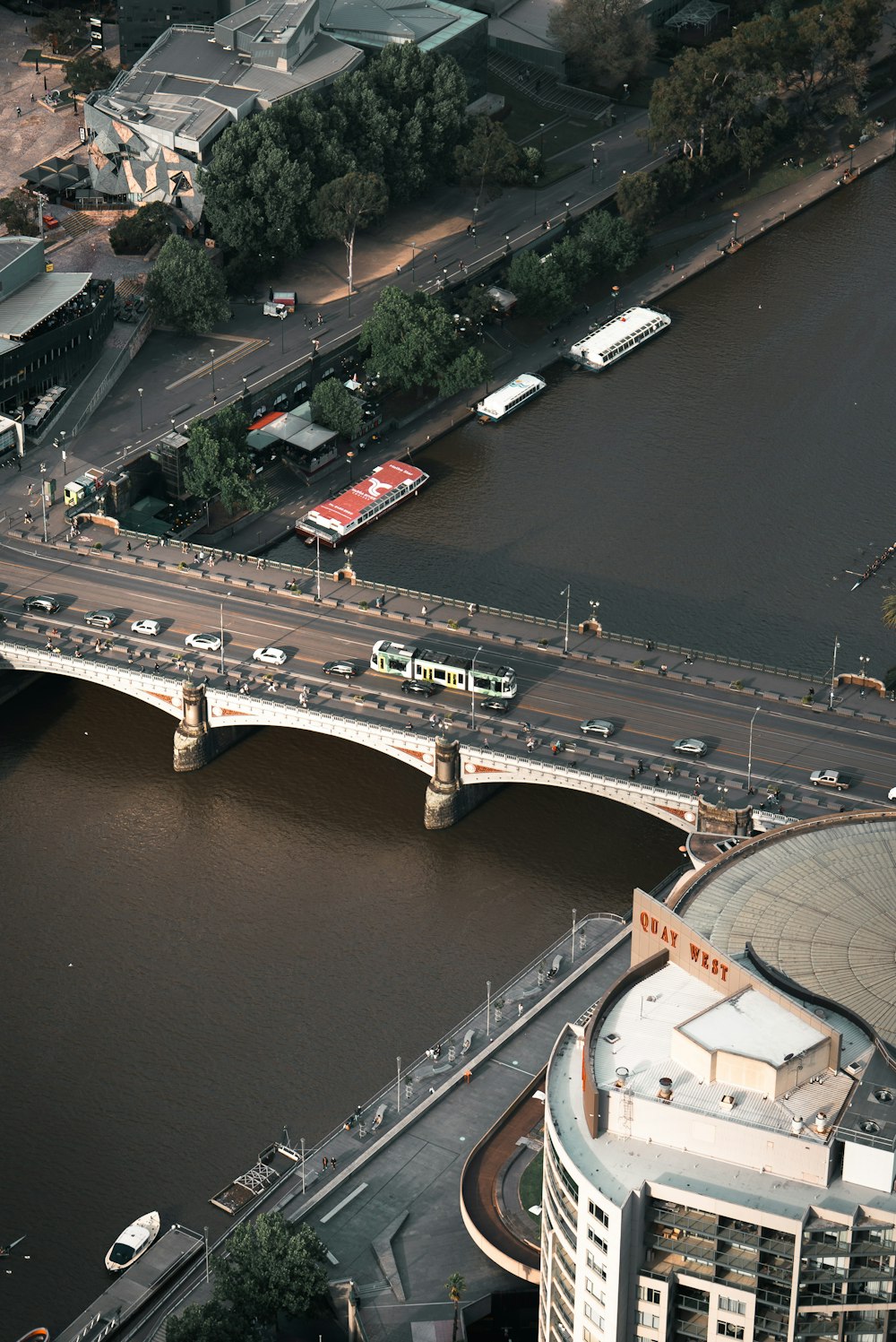 an aerial view of a bridge over a river