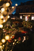 A charming outdoor Christmas display with lights and decorations.
