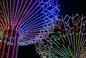 An elegant LED galaxy dance floor glowing with vibrant colors during a party.