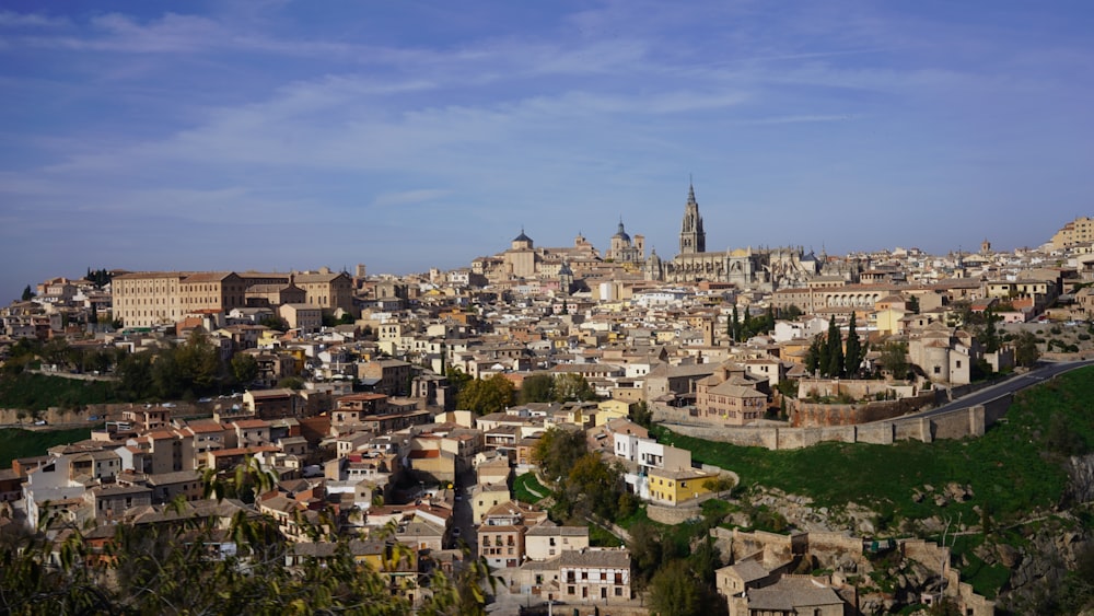 a view of a city from a hill