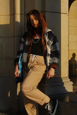 Outdoor shot of a layered outfit combining comfort and style in natural sunlight.
