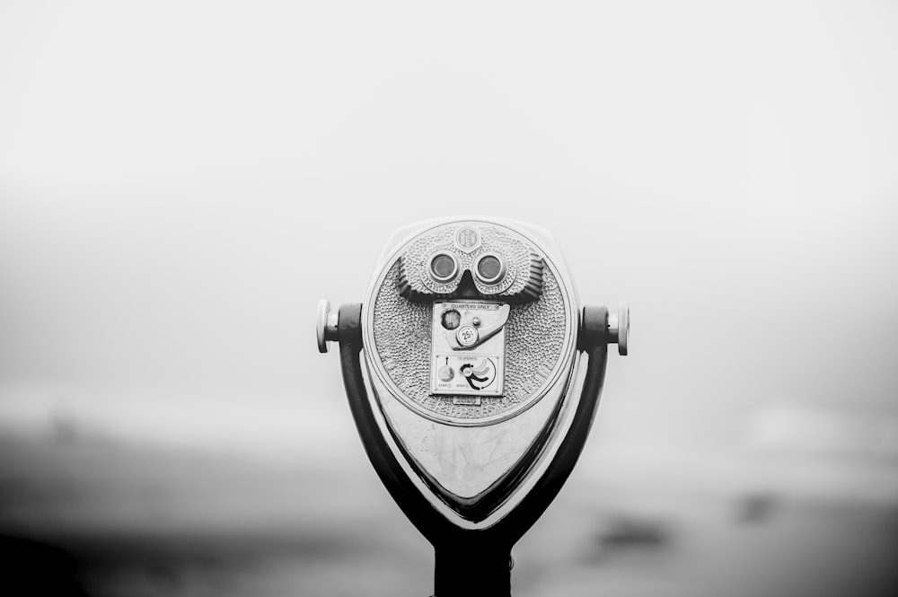 a close up of a coin operated parking meter