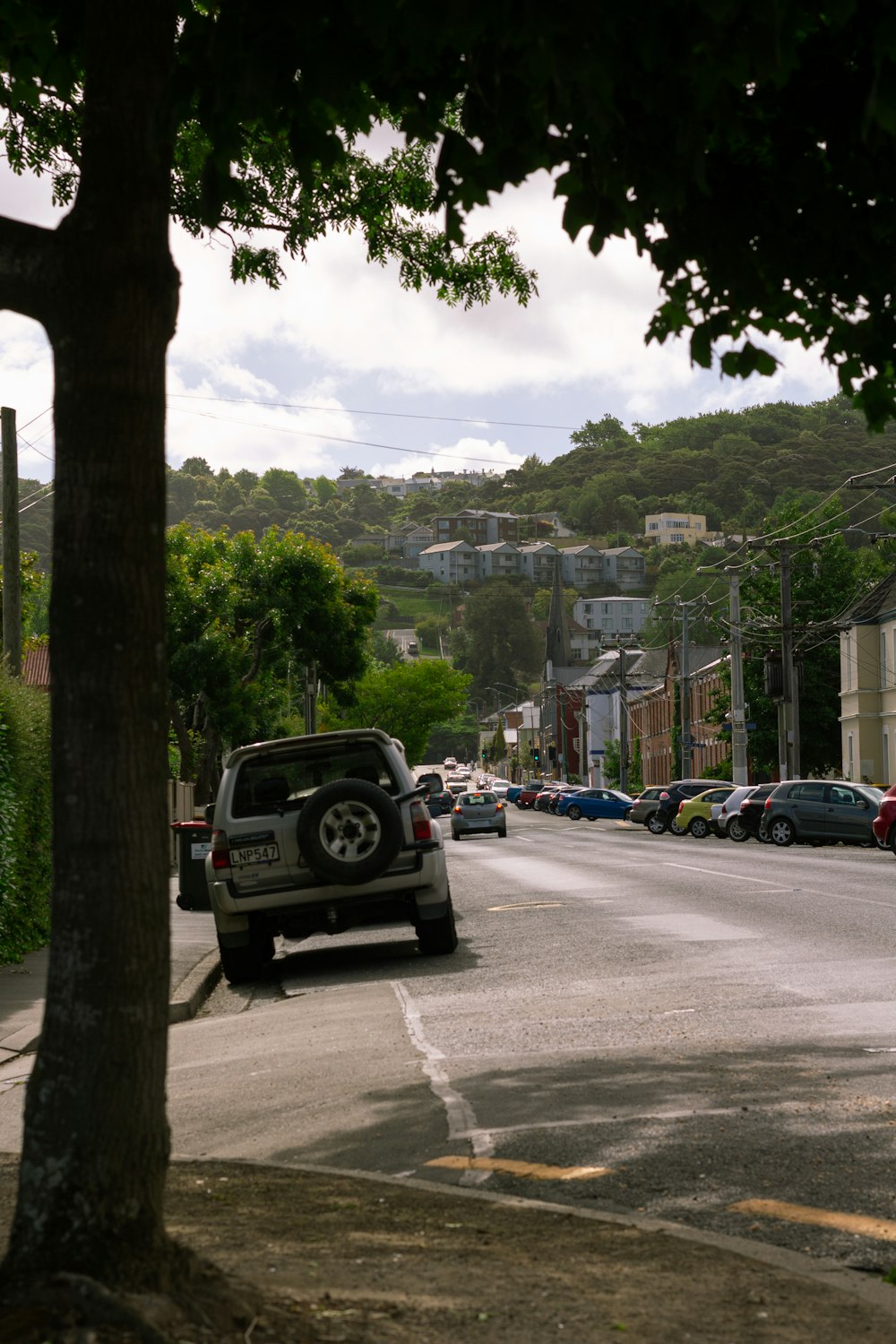 a car is parked on the side of the road