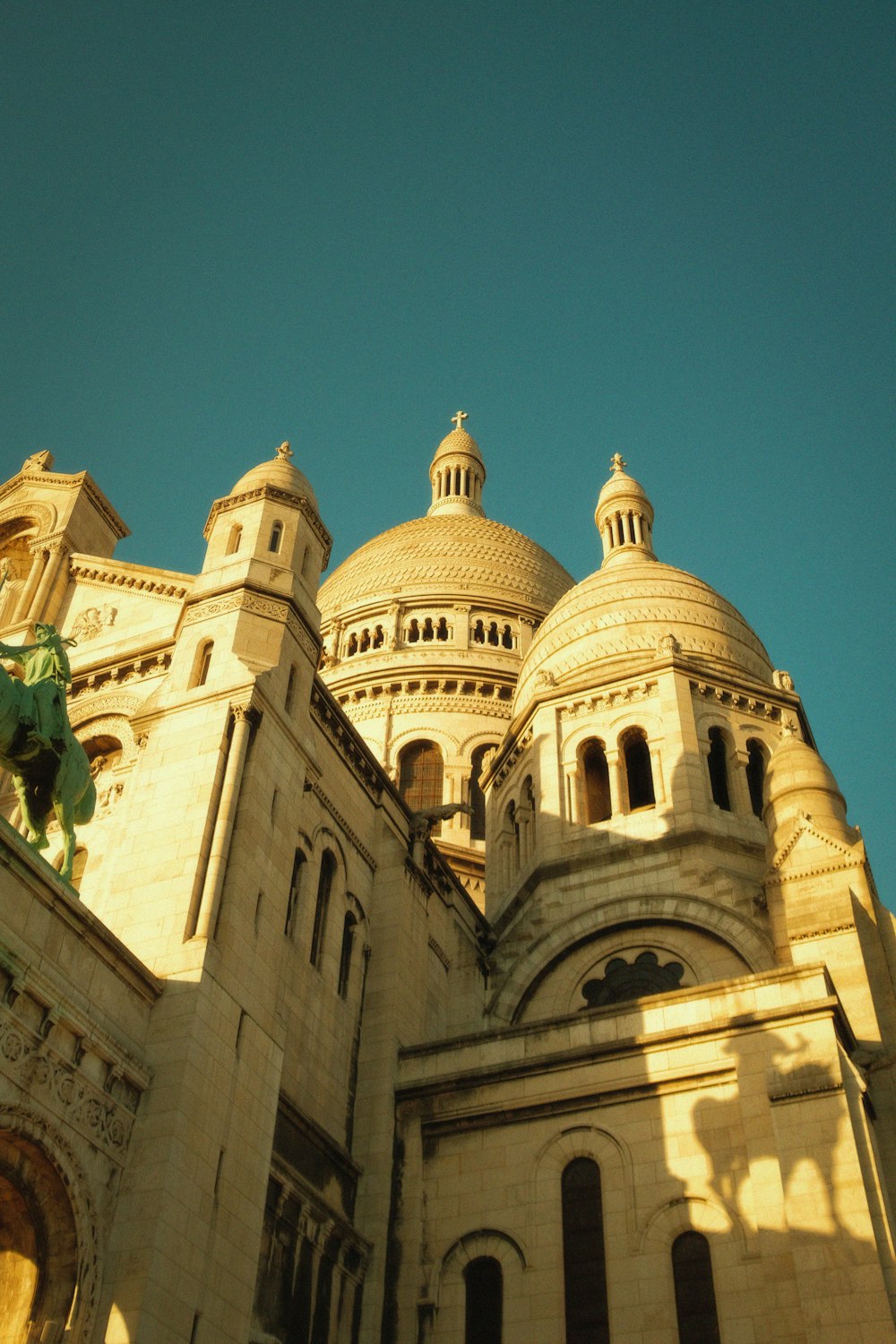 a large building with a clock on the front of it