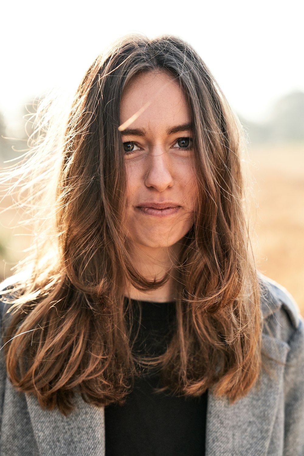 a close up of a person with long hair