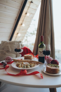 A cozy setting with a glass of bednog and festive decorations.