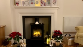 New furnace being installed in a cozy family living room.