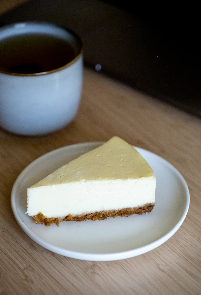 Porción de pastel de queso
