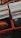 Stacks of vinyl records are neatly arranged in plastic crates. The front covers of two albums, one by Black Sabbath and another by Moby, are prominently visible, suggesting a collection of diverse music genres.