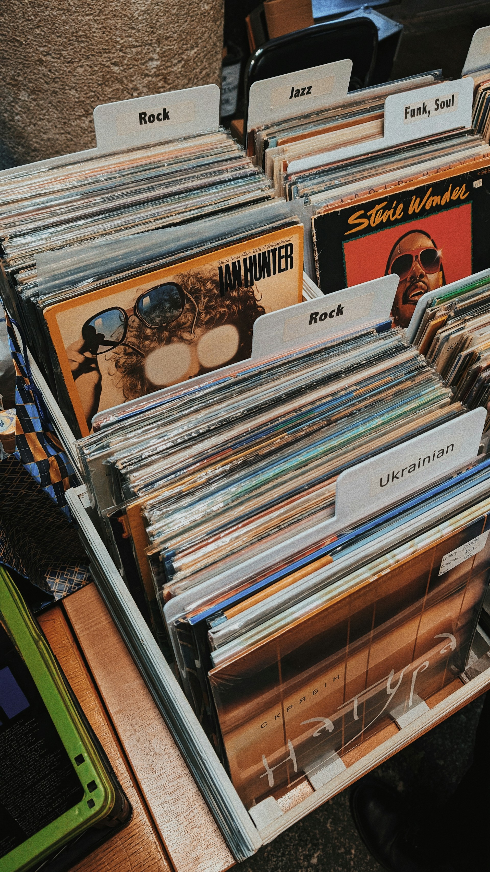 a bunch of records that are on a table