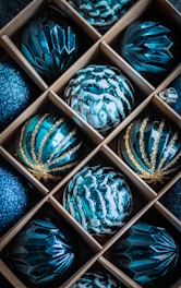 A collection of unique, translucent matte blue gift designs displayed elegantly.