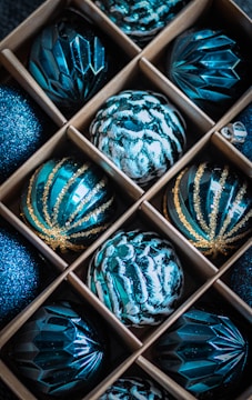 A collection of unique, translucent matte blue gift designs displayed elegantly.