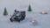 A miniature military vehicle is set on a snowy landscape, surrounded by small lit tealight candles and tiny model pine trees. The scene creates a winter diorama effect.
