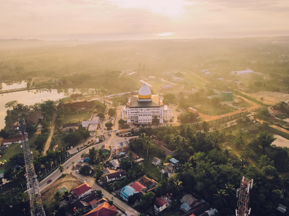 an aerial view of a town with a church