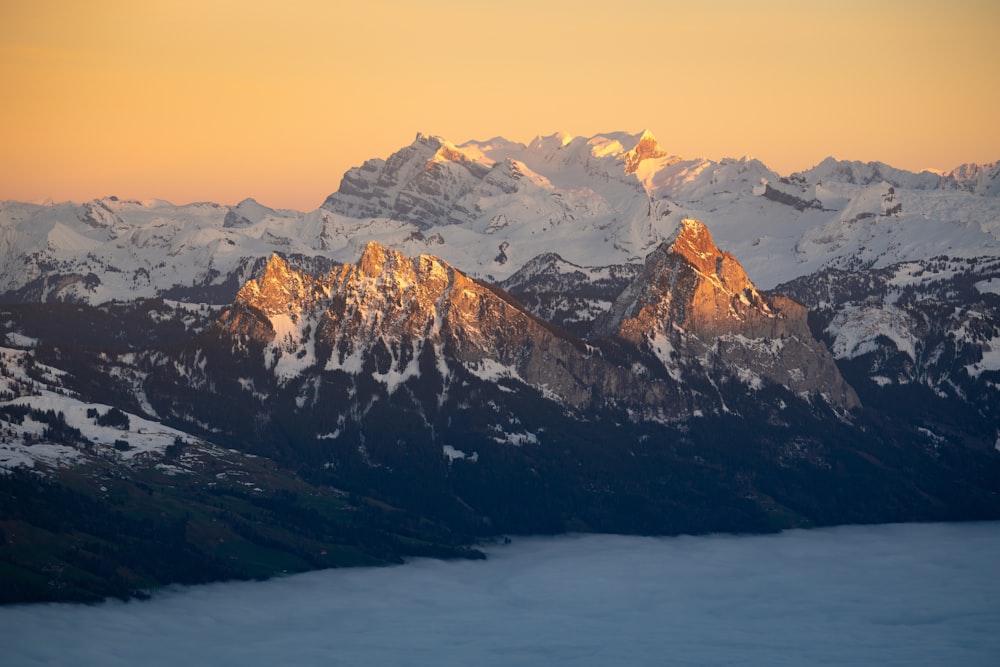 a view of a mountain range at sunset