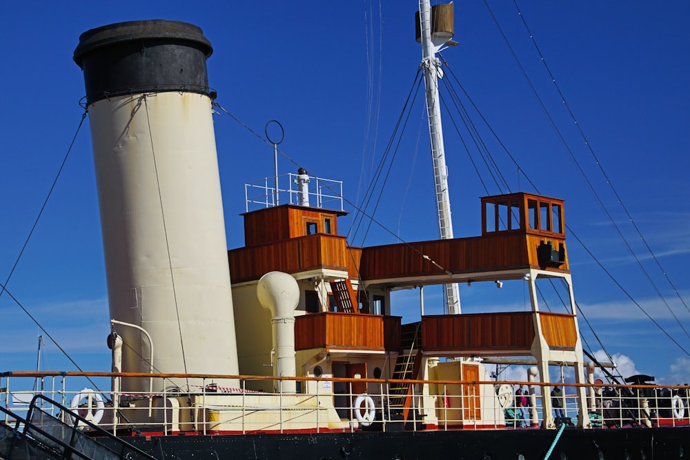 a large boat with a tower on top of it
