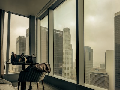 Cozy downtown apartment with large windows overlooking the city skyline.