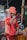 a man in a turban and sunglasses on a bike